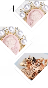 Detail view of pink Victorian cameo brooch showing alloy texture, zircon and safety clasp