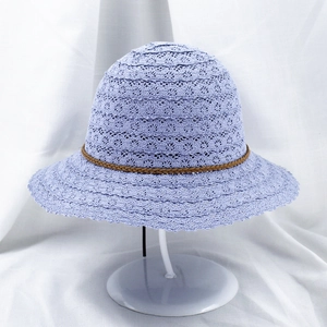Detail of light purple hollow lace sun hat with woven leather trim and wavy texture