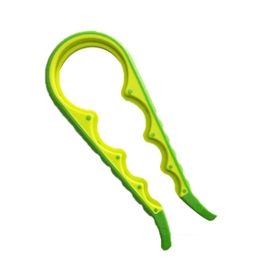 Green 4-in-1 multifunctional non-slip jar opener for various bottle cap sizes on white background