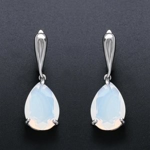 Elegant silver teardrop earrings with pear-cut white opal stones for evening gala parties