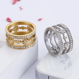 Star cutout titanium steel rings in gold and silver finish with pavé set zircon stones