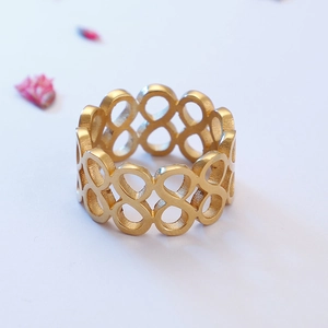 Gold infinity loop ring in minimalist stainless steel, elegant streetwear jewelry style