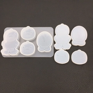 Detail view of various duck-shaped silicone molds for DIY resin and gypsum crafts
