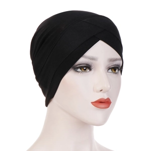 Detail view of the criss-cross front design on a black elastic turban headscarf