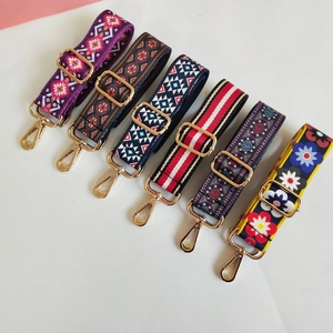 Ethnic style adjustable fabric bag straps with geometric patterns and gold metal hardware
