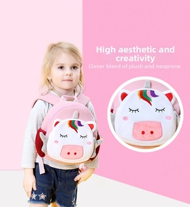 Detail of unicorn kids backpack showing soft plush and neoprene fabric material mix