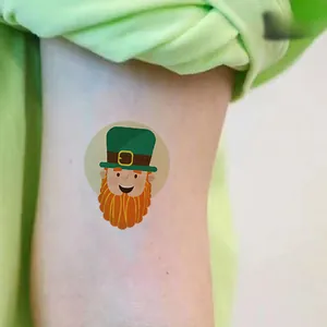 Close-up of St. Patrick's Day tattoo with Leprechaun cartoon on a child's arm