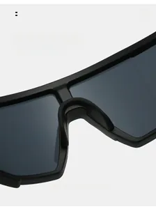 Macro view of the comfortable integrated nose pads on black matte sports sunglasses