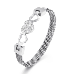 Silver Milanese mesh bracelet featuring a sparkling pavé zircon heart and hollow heart accents