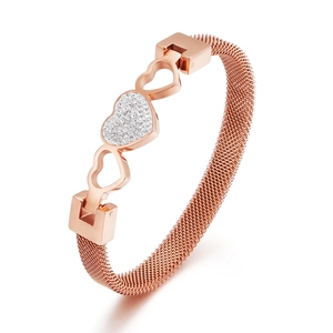 Elegant rose gold mesh bracelet with hollow and pavé-set zircon heart charms