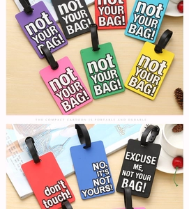 Colorful PVC luggage tags with bold text including Not Your Bag and Don't Touch
