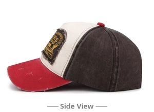 Side view of vintage washed baseball cap with distressed brim and embroidered patch