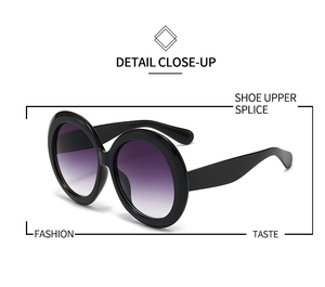 Gros plan détaillé de lunettes de soleil rondes avec monture noire et verres dégradés violets