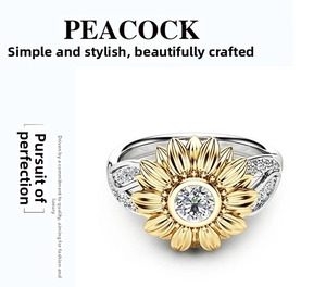 Detailed close-up of a two-tone sunflower ring featuring a golden flower and crystal band