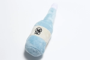 Close-up of the plush squeaky bottle toy with No! embroidery and soft texture