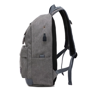 Zaino grigio in tela per viaggio e scuola con porta di ricarica USB, vista laterale