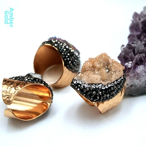 Detailed view of handmade amber gold druzy quartz adjustable rings with vintage finish