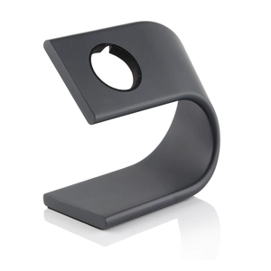 Macro shot of matte black U-shaped aluminum stand for Apple Watch with round cutout