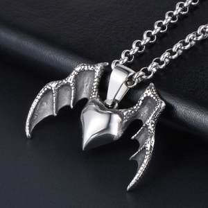 Vintage titanium steel necklace featuring a polished heart pendant with retro bat wings