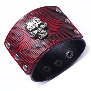 Punk red leather wide bracelet with silver metal skull studs and embossed patterns
