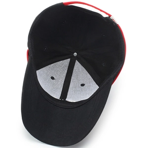 Internal view of black and red baseball cap with embroidery and adjustable strap