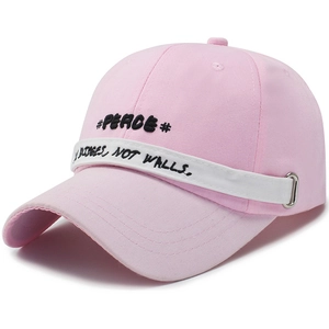 Pink baseball cap with black peace embroidery and decorative white strap design