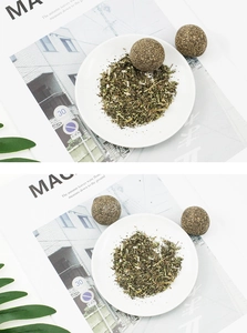 Detail view of natural catnip balls and dried silvervine leaves for cat dental health