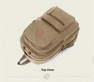 Top view detail of durable khaki canvas backpack showing multiple zippered compartments