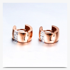 Close-up of 7mm gold titanium steel hoop earrings with inlaid clear zircon crystals