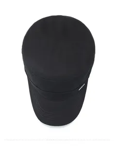 Top view of a black flat top military cap with cotton canvas texture and metal detail