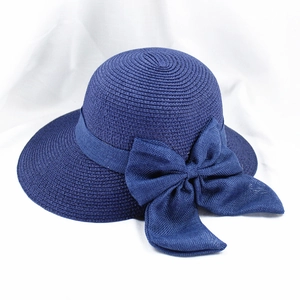 Chapeau de soleil pliable en paille bleu marine pour femme avec grand nœud élégant