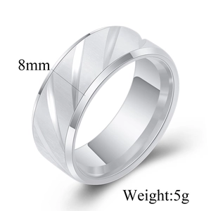 Detail view of 8mm wide brushed silver ring with diagonal stripes showing weight 5g