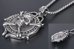Detailed front and back view of punk skull and crossbones steering wheel pendant in steel