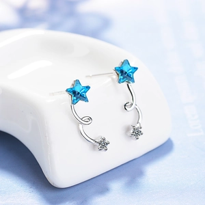Elegant blue star stud earrings in silver finish with sparkling crystal accents