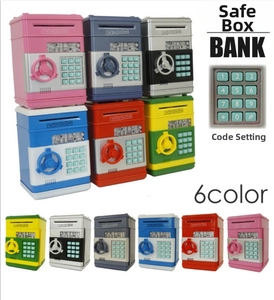 Detail of ATM savings bank keypad and six available colors in electronic plastic safe box