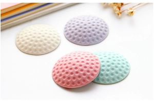 Set di quattro protezioni murali in silicone pastello e ammortizzatori per porte