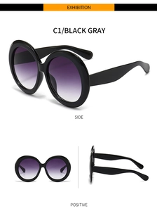 Vues détaillées des lunettes de soleil rondes oversize avec monture noire et verres violets