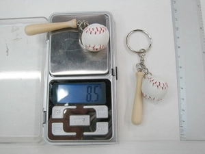 Mini baseball bat and ball keychain scale and ruler measurements showing 8.5g weight
