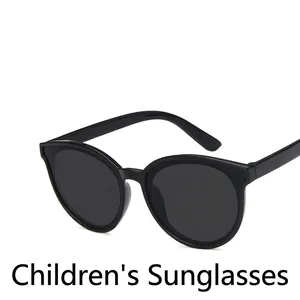 Classic black round cat-eye sunglasses for kids with durable frames for UV protection