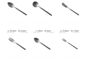Detailed view of matte vintage stainless steel cutlery set with sizes and weights