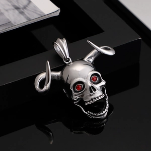 Men's rock hip-hop horned skull pendant with red gemstone eyes on black surface