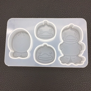 Detailed macro view of a 4-cavity silicone duck mold for DIY resin and plaster crafts