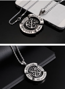Detailed close-up of a vintage steel anchor medallion pendant with Houston Way Sea text
