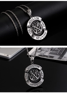 Macro detail of nautical anchor pendant and twisted rope chain on premium dark surfaces