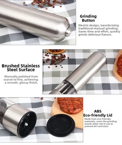 Macro detail of electric stainless steel pepper grinder with top button and ABS cover