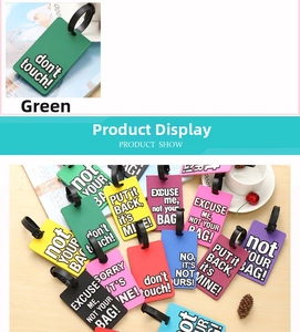 Detail of colorful PVC luggage tags with bold slogans and adjustable black straps