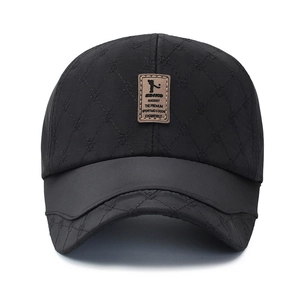 Casquette de baseball noire pour homme avec motif matelassé et écusson en cuir brun