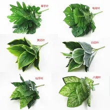 Detailed collection of six tropical faux leaves including monstera and fern styles