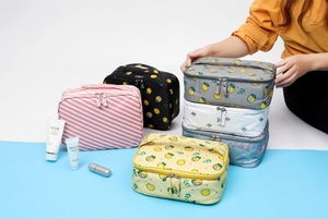 Macro view of several waterproof nylon cosmetic bags with different colorful patterns