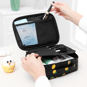 Waterproof double-layer cosmetic bag with lemon pattern and interior mesh organizer pockets